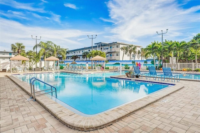 6020 S Shore Blvd Unit 709, Gulfport, FL 33707 - community pool with a patio area