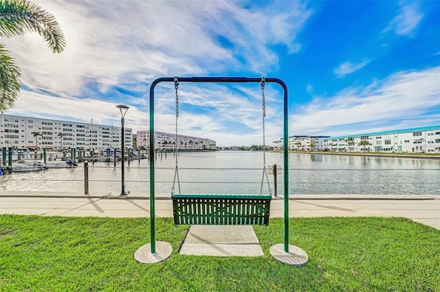 6020 S Shore Blvd Unit 709, Gulfport, FL 33707 - surrounding community featuring a lawn and a water view