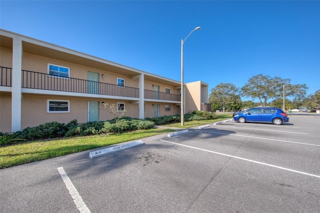 12300 Park Blvd Unit 222, Seminole, FL 33772 - view of property featuring uncovered parking