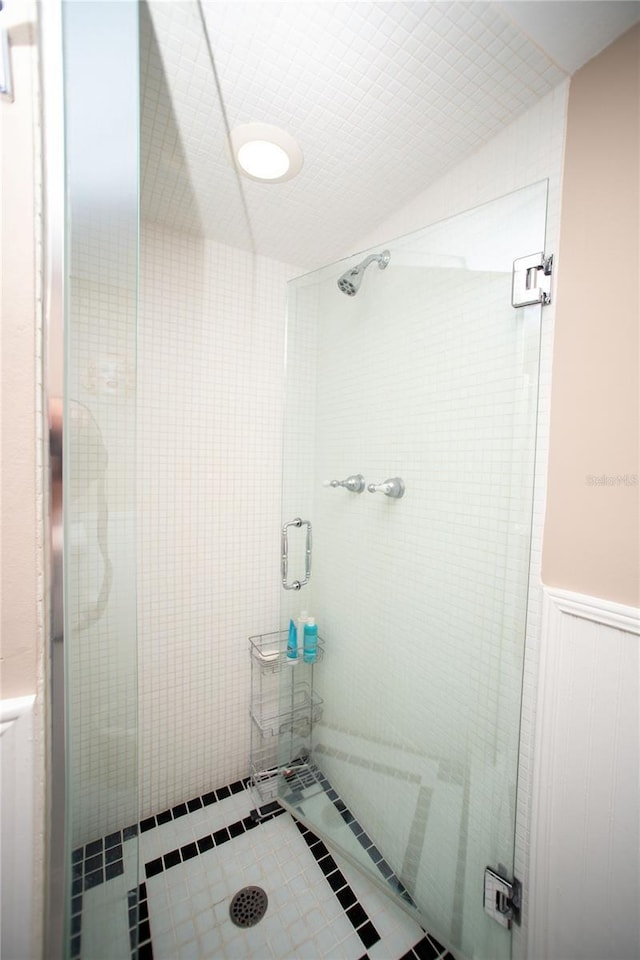 12300 Park Blvd Unit 222, Seminole, FL 33772 - bathroom with a shower stall and wainscoting