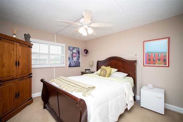 12300 Park Blvd Unit 222, Seminole, FL 33772 - bedroom with light carpet, baseboards, and ceiling fan