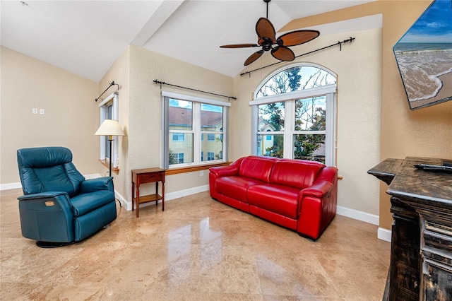 10764 70th Ave Unit 5302, Seminole, FL 33772 - living area featuring lofted ceiling, ceiling fan, baseboards, and a textured wall