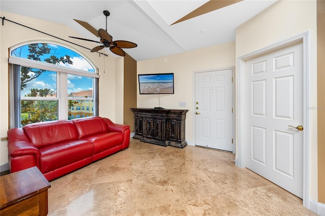 10764 70th Ave Unit 5302, Seminole, FL 33772 - living area featuring lofted ceiling, ceiling fan, and baseboards