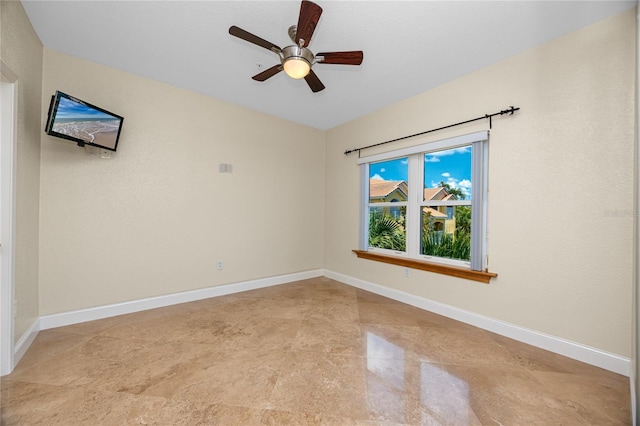 10764 70th Ave Unit 5302, Seminole, FL 33772 - spare room with a ceiling fan and baseboards