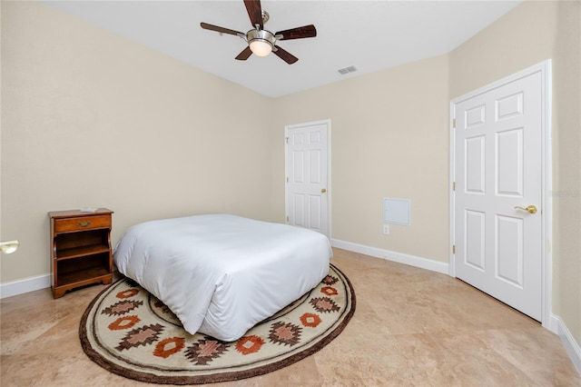 10764 70th Ave Unit 5302, Seminole, FL 33772 - bedroom featuring baseboards and a ceiling fan