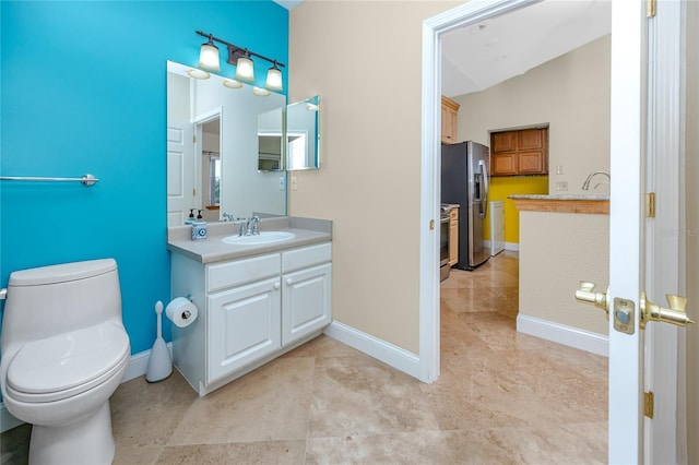 10764 70th Ave Unit 5302, Seminole, FL 33772 - bathroom with vanity, toilet, and baseboards