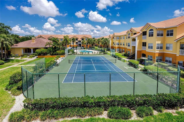 10764 70th Ave Unit 5302, Seminole, FL 33772 - view of tennis court with a residential view