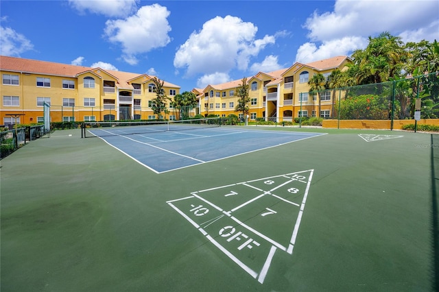 10764 70th Ave Unit 5302, Seminole, FL 33772 - view of community with a tennis court and shuffleboard