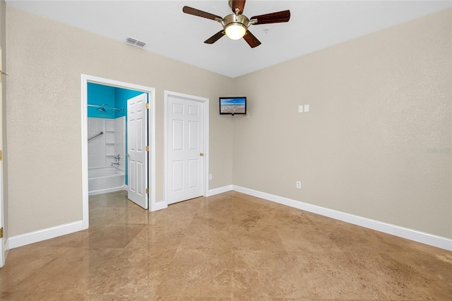 10764 70th Ave Unit 5302, Seminole, FL 33772 - unfurnished bedroom featuring baseboards and ceiling fan