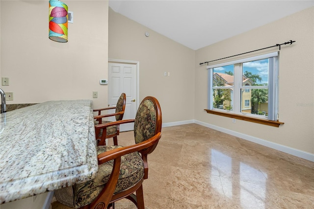 10764 70th Ave Unit 5302, Seminole, FL 33772 - dining area with baseboards and high vaulted ceiling