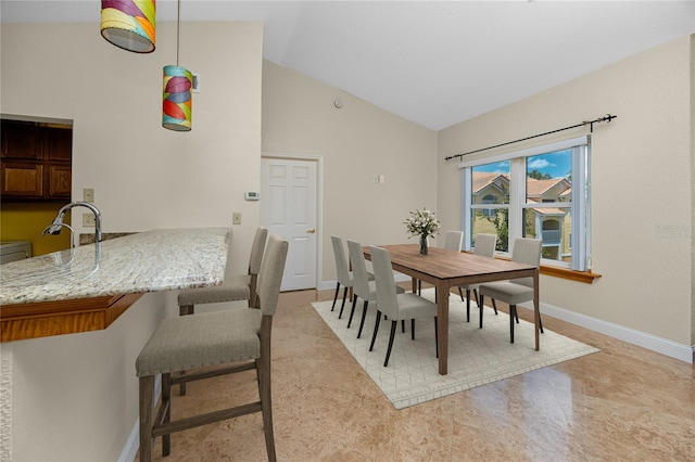 10764 70th Ave Unit 5302, Seminole, FL 33772 - dining room with baseboards and high vaulted ceiling