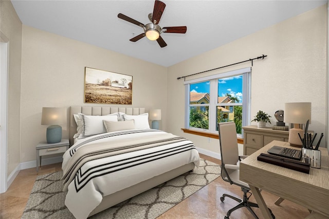 10764 70th Ave Unit 5302, Seminole, FL 33772 - bedroom featuring an office area, baseboards, and a ceiling fan