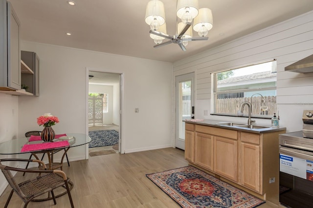 314 Bath St, Tarpon Springs, FL 34689 - kitchen featuring a sink, stainless steel electric range oven, a chandelier, light wood-style flooring, and light brown cabinetry