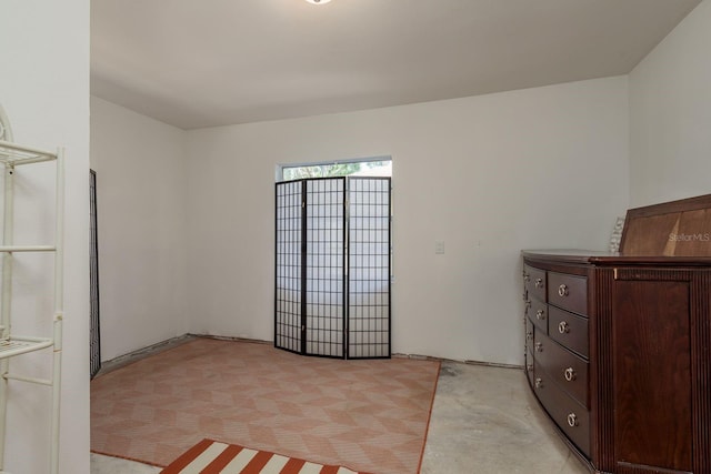 314 Bath St, Tarpon Springs, FL 34689 - unfurnished bedroom with light carpet