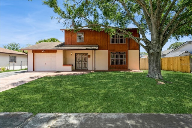 7317 W Pocahontas Ave, Tampa, FL 33634 - view of front of home featuring a garage, driveway, french doors, and stucco siding
