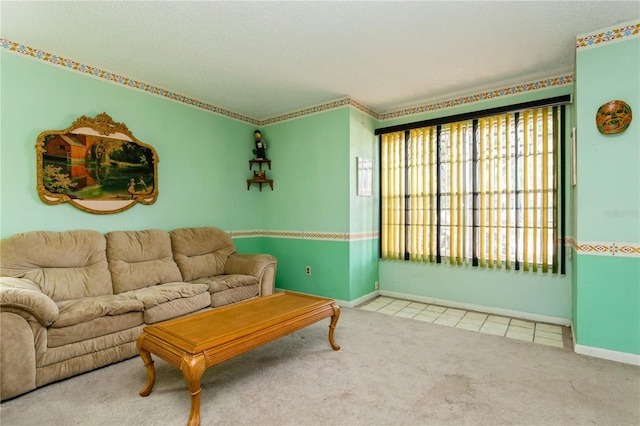 7317 W Pocahontas Ave, Tampa, FL 33634 - living area with carpet, tile patterned floors, and baseboards