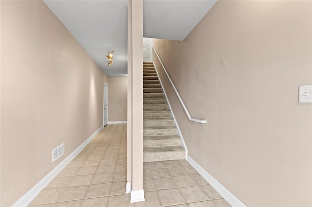 6319 Sunset Bay Cir, Apollo Beach, FL 33572 - stairs featuring tile patterned flooring and baseboards