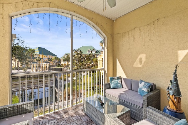 6319 Sunset Bay Cir, Apollo Beach, FL 33572 - balcony featuring a ceiling fan and a residential view