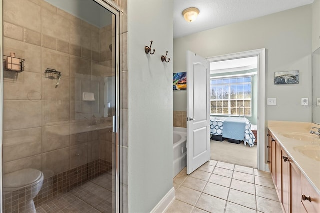6319 Sunset Bay Cir, Apollo Beach, FL 33572 - ensuite bathroom with tile patterned floors, a stall shower, and double vanity