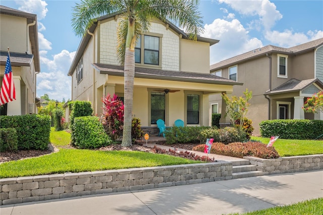 4264 Bexley Village Dr, Land O Lakes, FL 34638 - view of front of house with covered porch and stucco siding