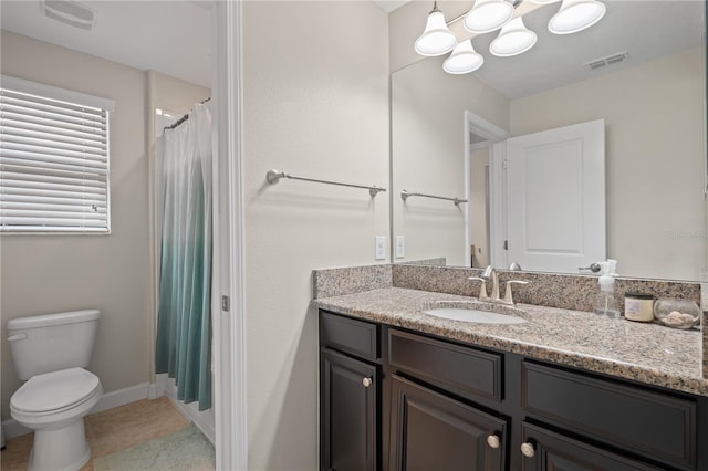 4264 Bexley Village Dr, Land O Lakes, FL 34638 - full bath featuring vanity, toilet, a chandelier, tile patterned floors, and baseboards
