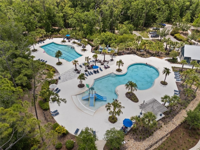 4264 Bexley Village Dr, Land O Lakes, FL 34638 - aerial view of a pool and a forest