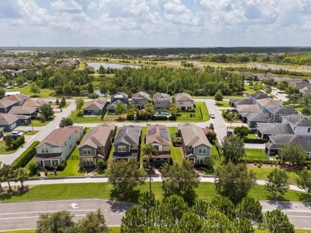 4264 Bexley Village Dr, Land O Lakes, FL 34638 - aerial view of residential area featuring a large body of water