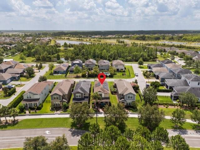 4264 Bexley Village Dr, Land O Lakes, FL 34638 - aerial view of residential area with a nearby body of water