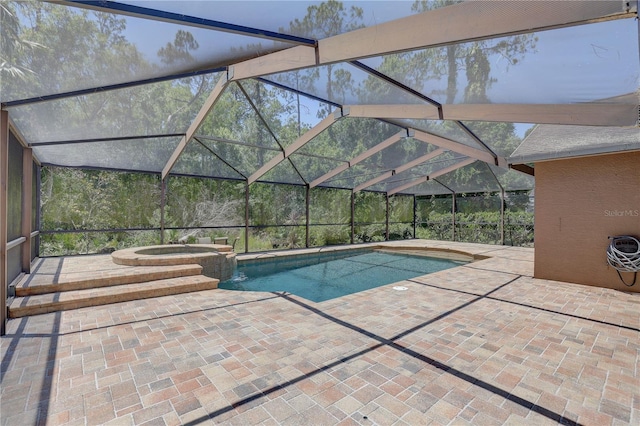 3338 Laurelwood Ct, Tarpon Springs, FL 34688 - view of pool with a patio area, glass enclosure, and a pool with connected hot tub