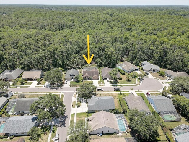 3338 Laurelwood Ct, Tarpon Springs, FL 34688 - aerial view of residential area featuring a forest