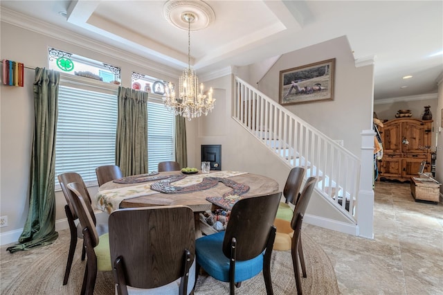 dining room with stairs, a chandelier, crown molding, and baseboards