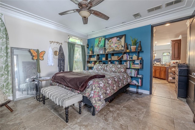 bedroom featuring ornamental molding and ensuite bathroom