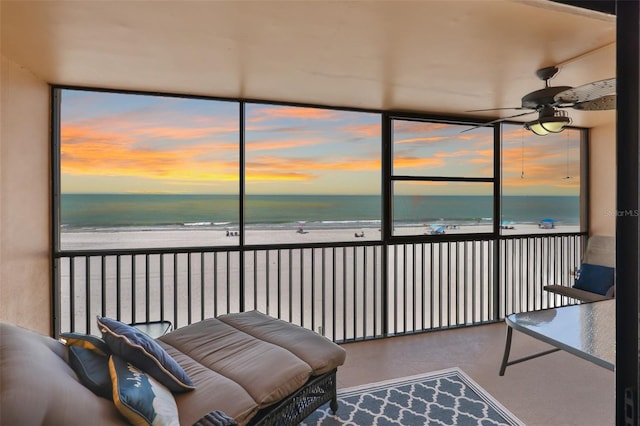 13720 Gulf Blvd Unit 302, Madeira Beach, FL 33708 - sunroom featuring view of water and beach