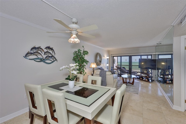 13720 Gulf Blvd Unit 302, Madeira Beach, FL 33708 - dining area with a textured ceiling, a ceiling fan, ornamental molding, light tile patterned flooring, and baseboards