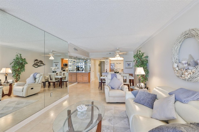 13720 Gulf Blvd Unit 302, Madeira Beach, FL 33708 - living area featuring ceiling fan, a textured ceiling, and ornamental molding