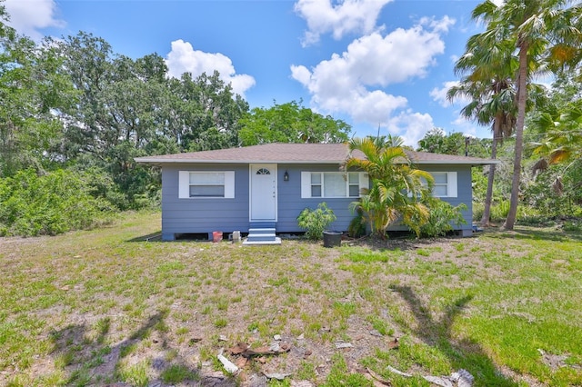2112 33rd St SE, Ruskin, FL 33570 - view of front of property with entry steps and a front yard