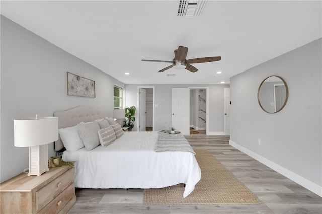 6914 Harbor Dr, Hudson, FL 34667 - bedroom featuring recessed lighting, light wood-style floors, baseboards, and a ceiling fan