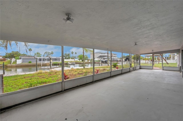 6914 Harbor Dr, Hudson, FL 34667 - unfurnished sunroom with a water view and a residential view