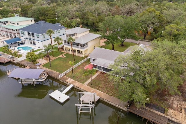 6914 Harbor Dr, Hudson, FL 34667 - drone / aerial view of a large body of water, a heavily wooded area, and a pool