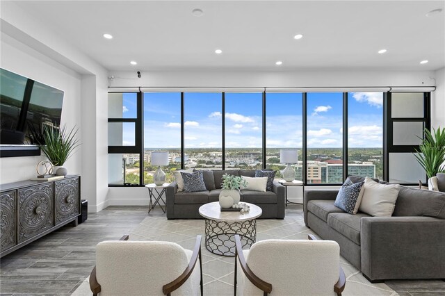 199 Dali Blvd Unit 2, Saint Petersburg, FL 33701 - living room with wood finished floors, recessed lighting, and baseboards