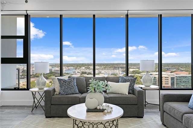 199 Dali Blvd Unit 2, Saint Petersburg, FL 33701 - living room with light wood-style flooring