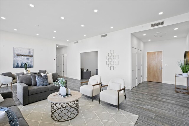 199 Dali Blvd Unit 2, Saint Petersburg, FL 33701 - living area featuring wood finished floors, recessed lighting, and baseboards