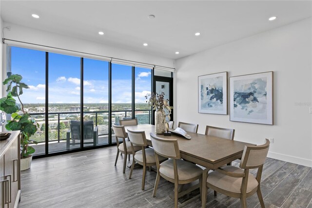 199 Dali Blvd Unit 2, Saint Petersburg, FL 33701 - dining room featuring wood finished floors, recessed lighting, and expansive windows
