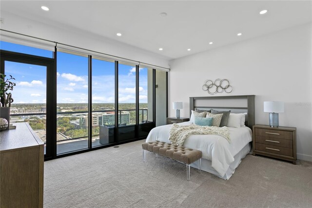 199 Dali Blvd Unit 2, Saint Petersburg, FL 33701 - bedroom with light carpet and recessed lighting