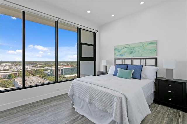 199 Dali Blvd Unit 2, Saint Petersburg, FL 33701 - bedroom featuring wood finished floors, recessed lighting, and baseboards