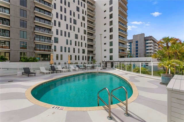 199 Dali Blvd Unit 2, Saint Petersburg, FL 33701 - community pool with fence and a patio
