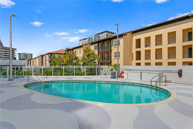 199 Dali Blvd Unit 2, Saint Petersburg, FL 33701 - community pool featuring fence and a patio