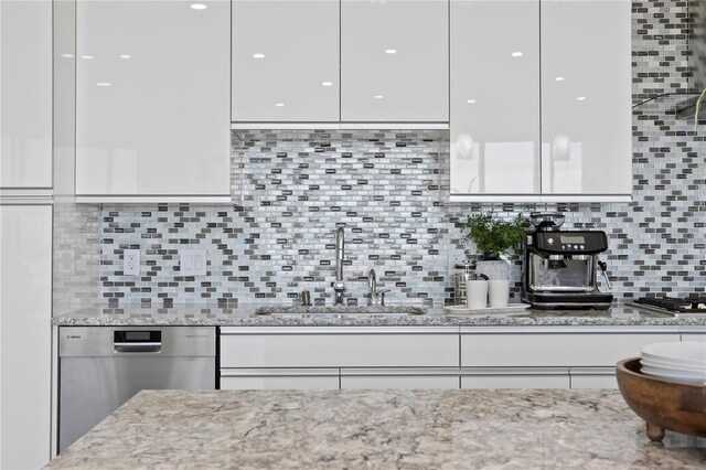 199 Dali Blvd Unit 2, Saint Petersburg, FL 33701 - kitchen with modern cabinets, appliances with stainless steel finishes, white cabinets, and a sink