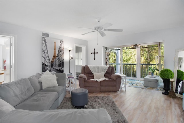 2533 Dolly Bay Dr Unit 203, Palm Harbor, FL 34684 - living area featuring light wood finished floors and ceiling fan