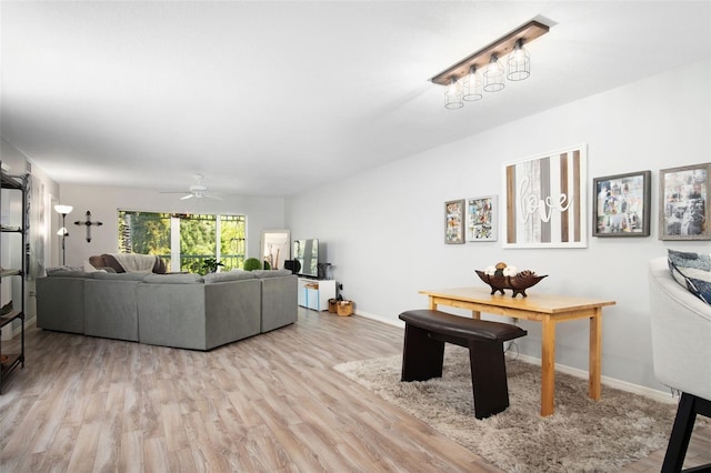 2533 Dolly Bay Dr Unit 203, Palm Harbor, FL 34684 - living area with wood finished floors, ceiling fan, and baseboards